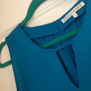 Blue sleeveless top with triangle cutout